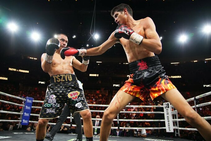 Кровавый махач! Фундора победил Тима Цзю и завоевал пояса WBC и WBO