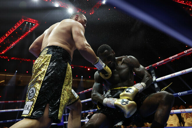 Мать Уайлдера призвала своего сына уйти из бокса после поражения от Чжана Мать Уайлдера призвала своего сына уйти из бокса после поражения от Чжана