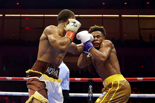 Девин Хейни уверенно перебоксировал Норманна и стал новым чемпионом мира